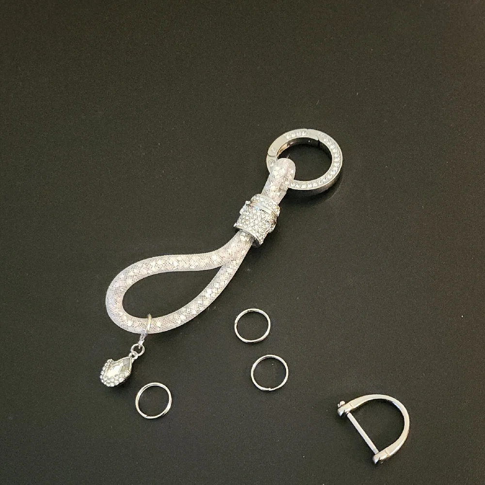 Elegant Silver Keychain And Accessory